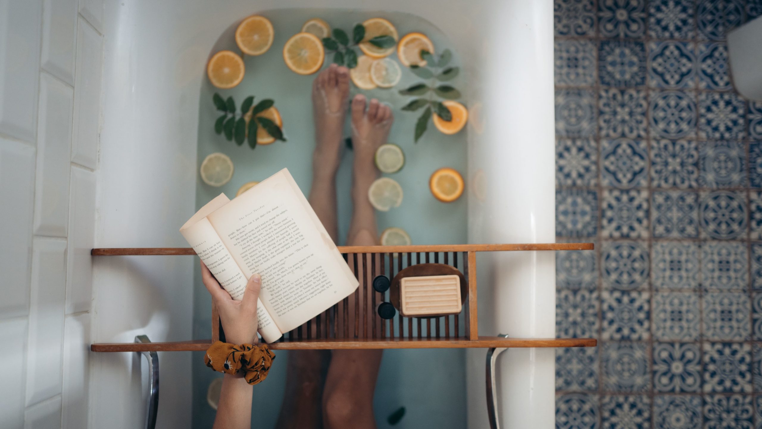 student reading in bathtub